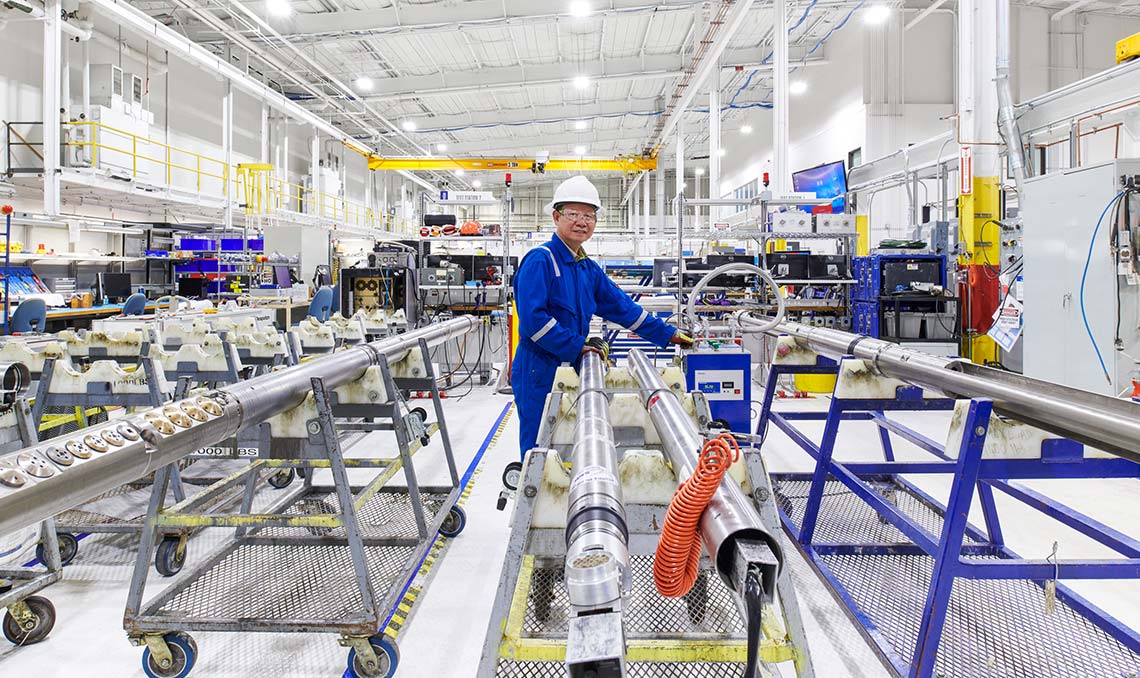 Employee in a Manufacturing Facility. Sugar Land, Texas (Tier 1_ManufacturingFacility_Sugar Land_AML_5396)