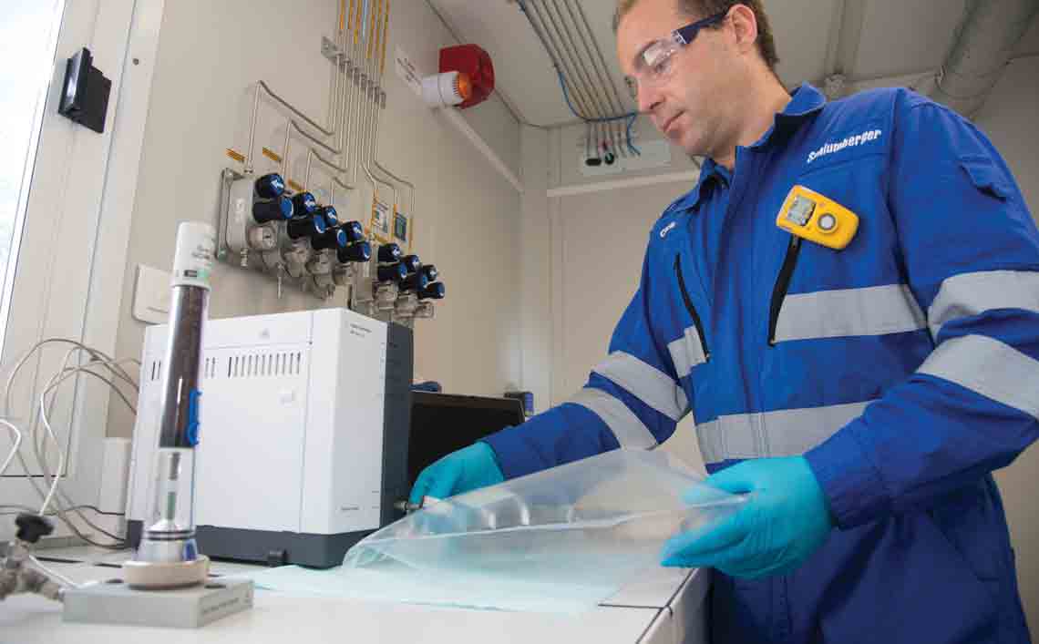 Male technician operating the fully portable MicroGC with an integrated thermal conductivity detector